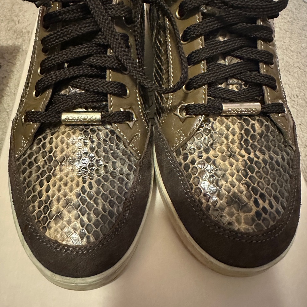 Women’s Elephant Skin Jimmy Choo sneakers.